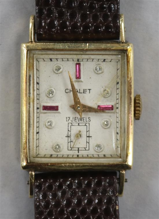 A ladys 14ct gold Chalet rectangular cased manual wind wrist watch.